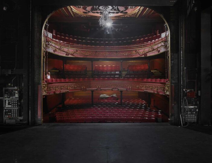 Empty theatre stalls, gallery, and upper circle as seen from on stage