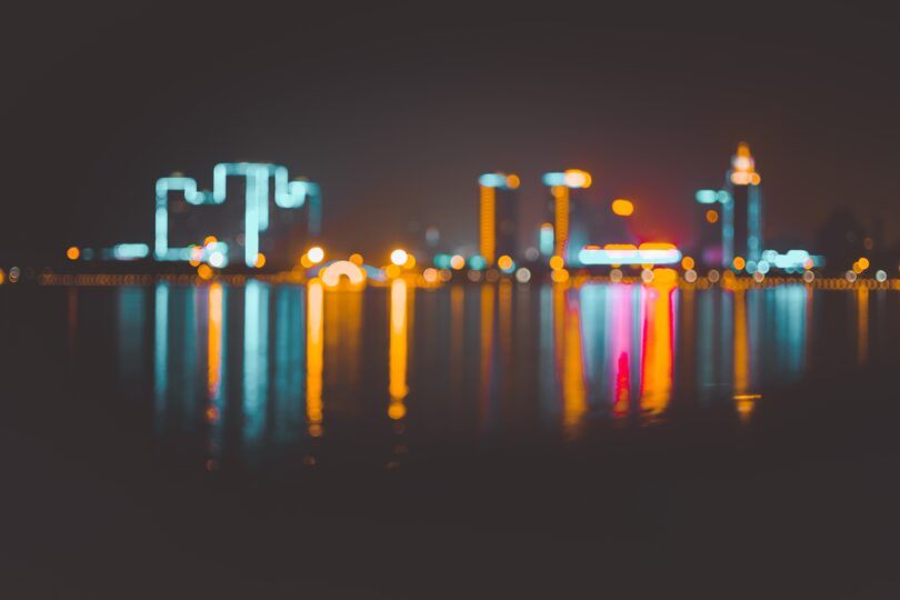 City skyline at night, out of focus