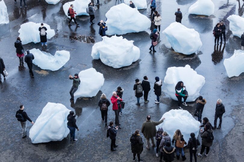 People looking at ice floes - Image: Ice Watch by Olafur Eliasson and Minik Rosing Supported by Bloomberg Installation: Bankside, outside Tate Modern, 2018