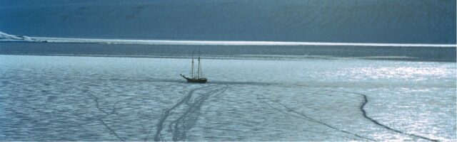 Boat sailing through frozen water