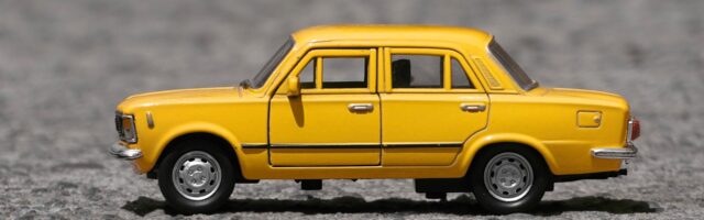 Small toy yellow car