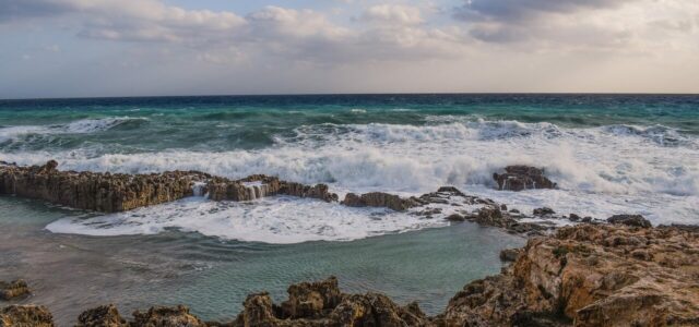 Waves crashing on rocks