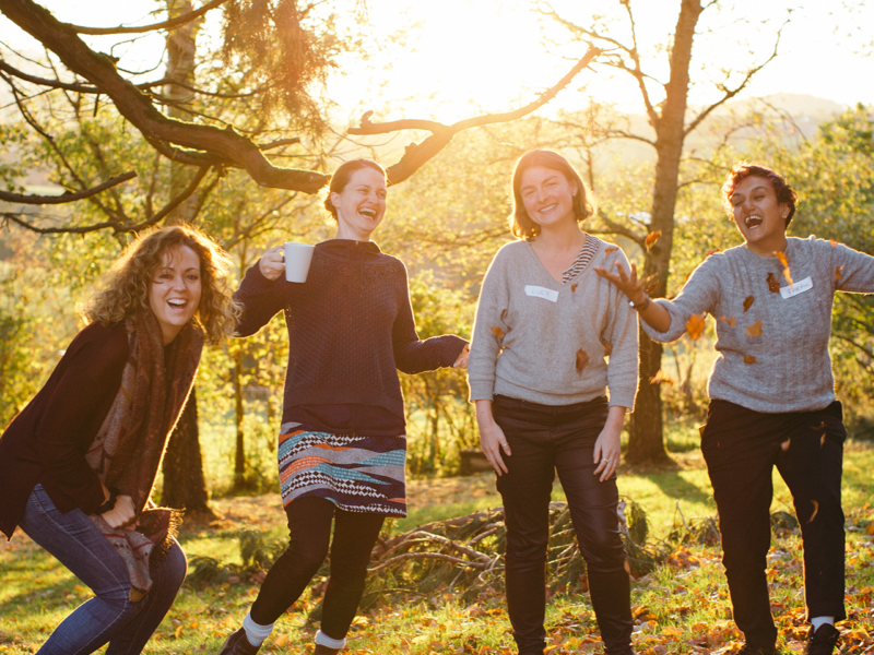 Accelerator JB team laughing against a background of trees