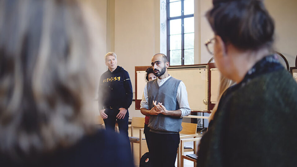 Person talking to a group