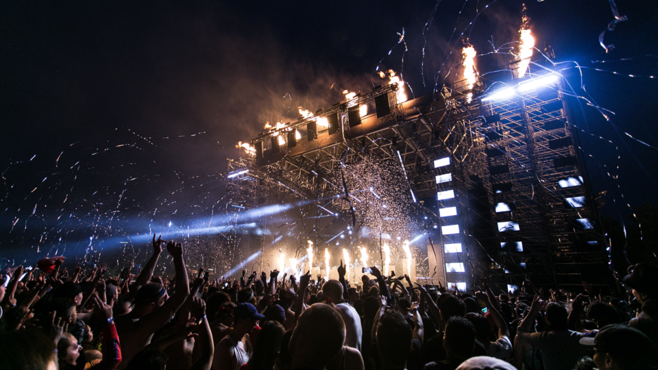 Fireworks coming from a festival stage