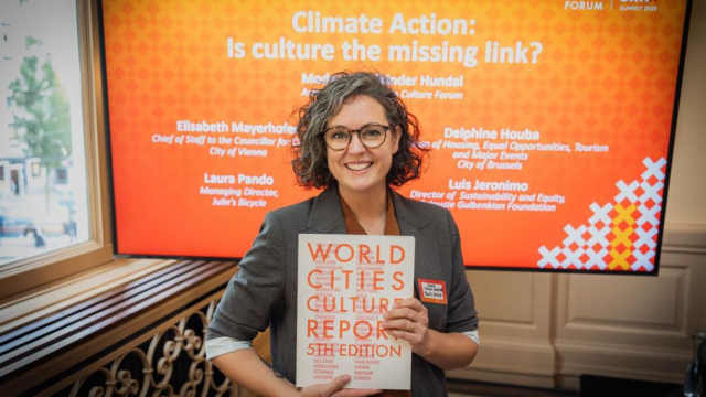 Laura Pando holding the WCCF report