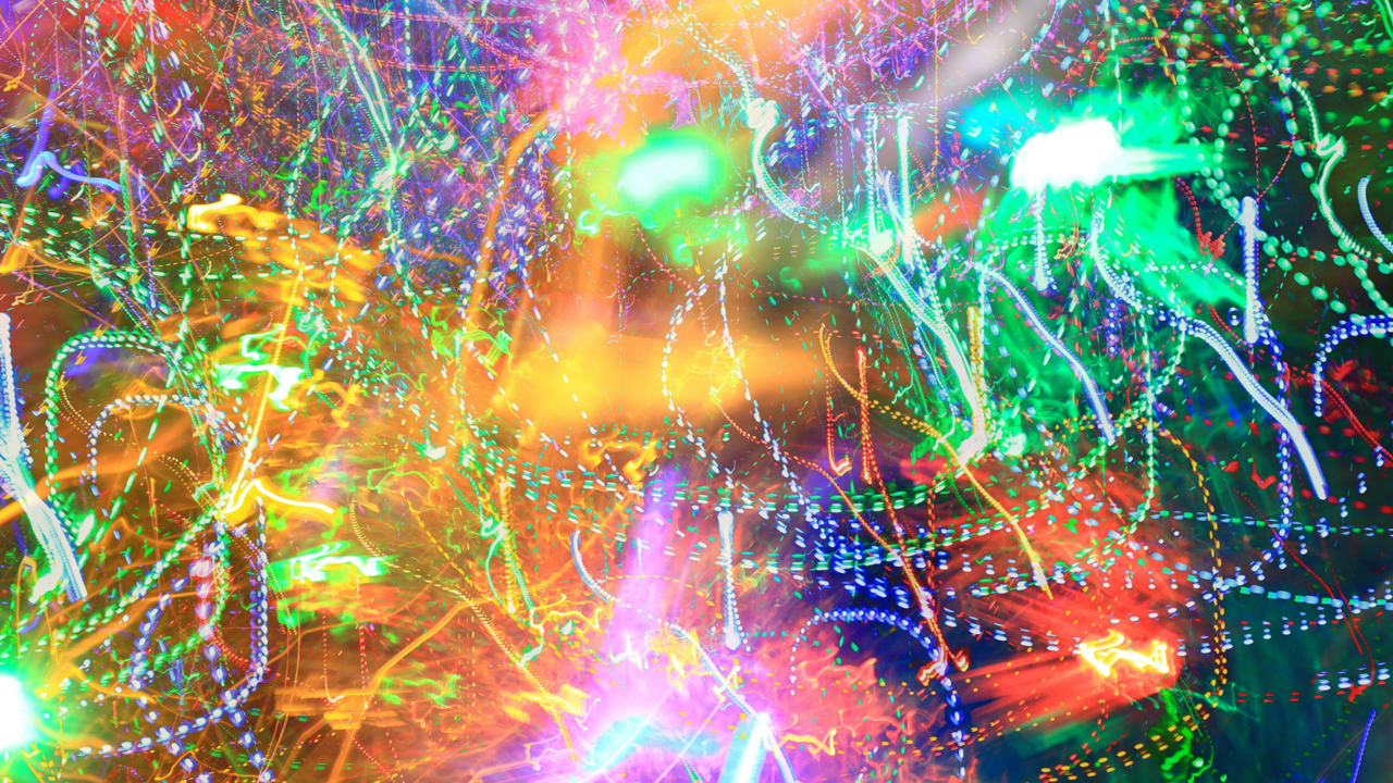 Brilliantly colored abstract image with curvy lines and smudgy areas.